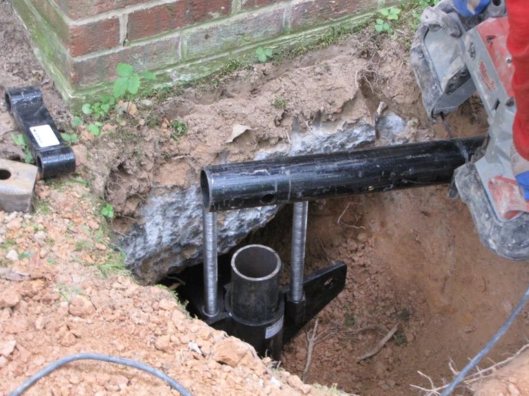 Helical piles & brackets installed Helical piles & brackets installed